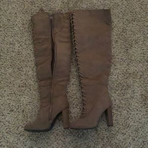 Tan lace up over the knee boots